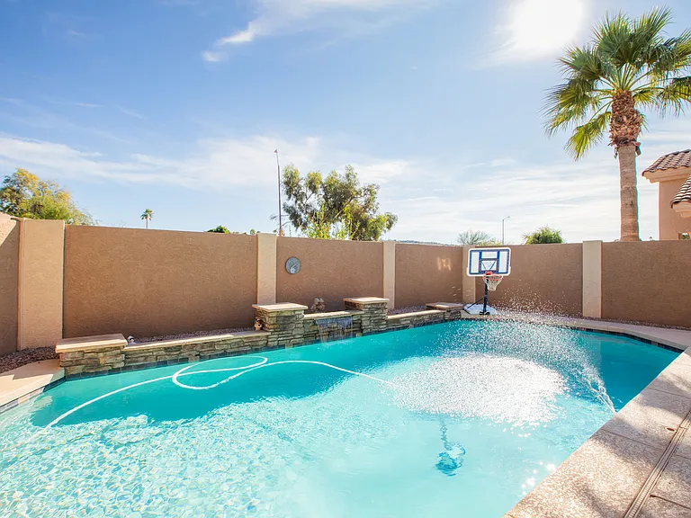 5.5 ft deep pool in the middle with a basketball hoop