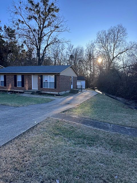 front of house with partial view of creek