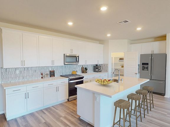 Residence 2 kitchen modeled at a nearby Meritage community.