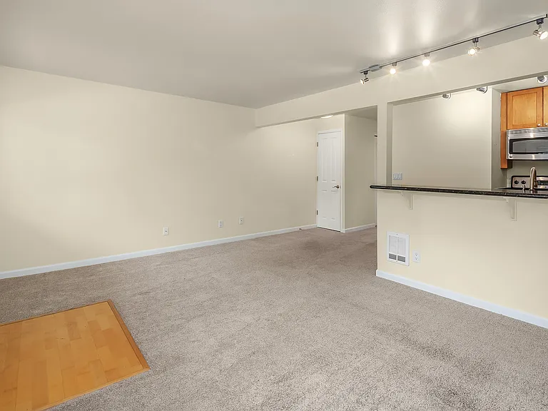 Living and dining areas from corner of living room