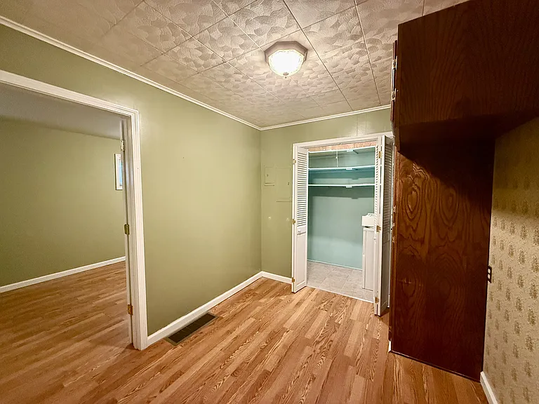 Bonus space with laundry closet and storage.