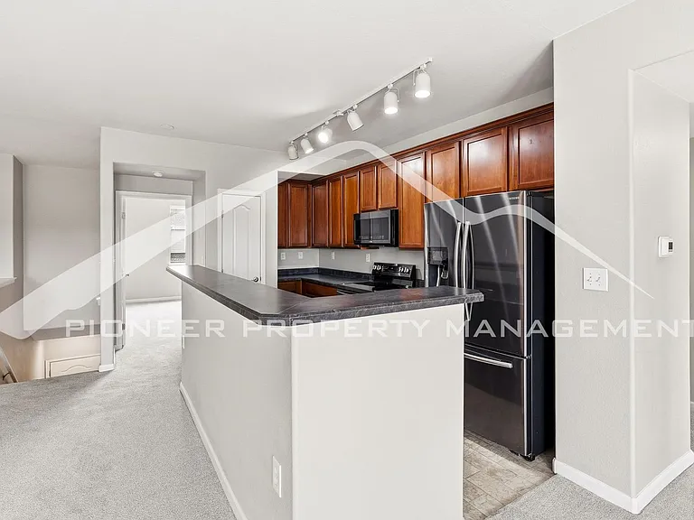 10089 W 55th Dr #203 — Photo 9