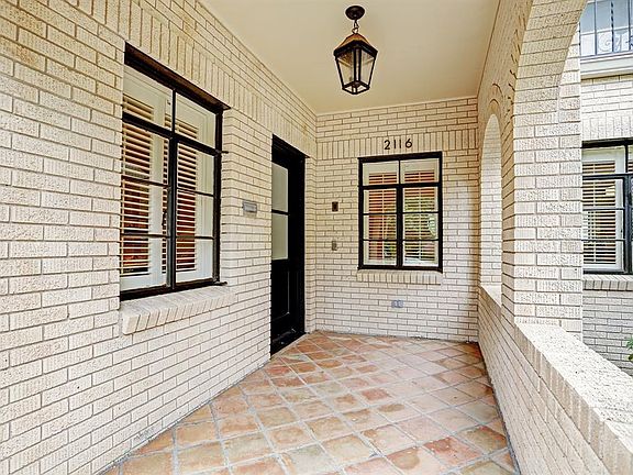 The inviting, roomy covered porch welcomes you into the home.