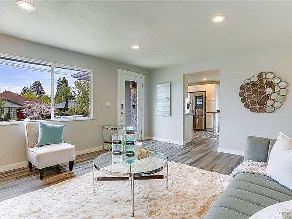 Say, "Alexa, turn on living room lights". Large picture-frame front window provides abundant natural light.