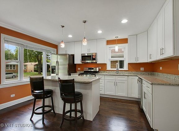 4th image of 9301 Lockwood Ave