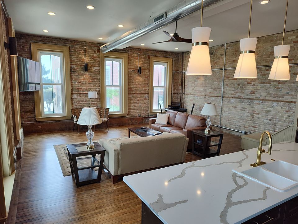 Kitchen, living room and dining table