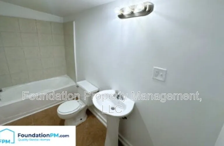1492 Faxon Ave — Photo 26