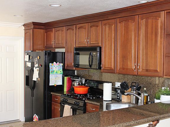 Kitchen with granite countertops.