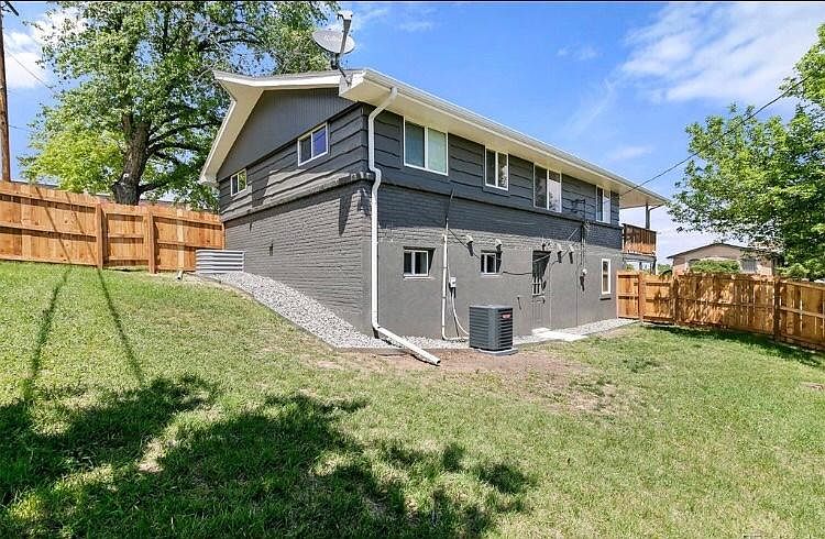 View of tenant's backyard & lower unit entrance from the SW corner of the yard.