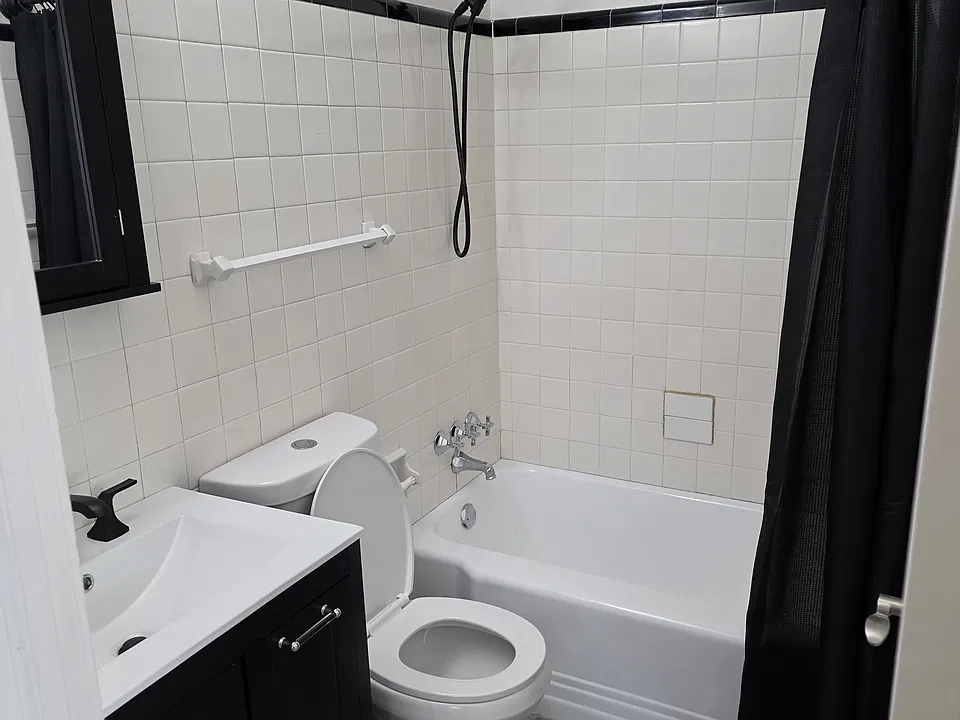 Updated bathroom, new cabinet, new fixtures and toilet