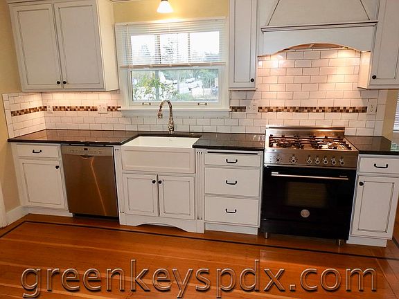 Dishwasher, sink, and gas range