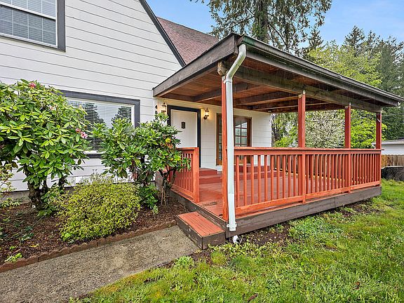 Large, front deck with french doors to master.