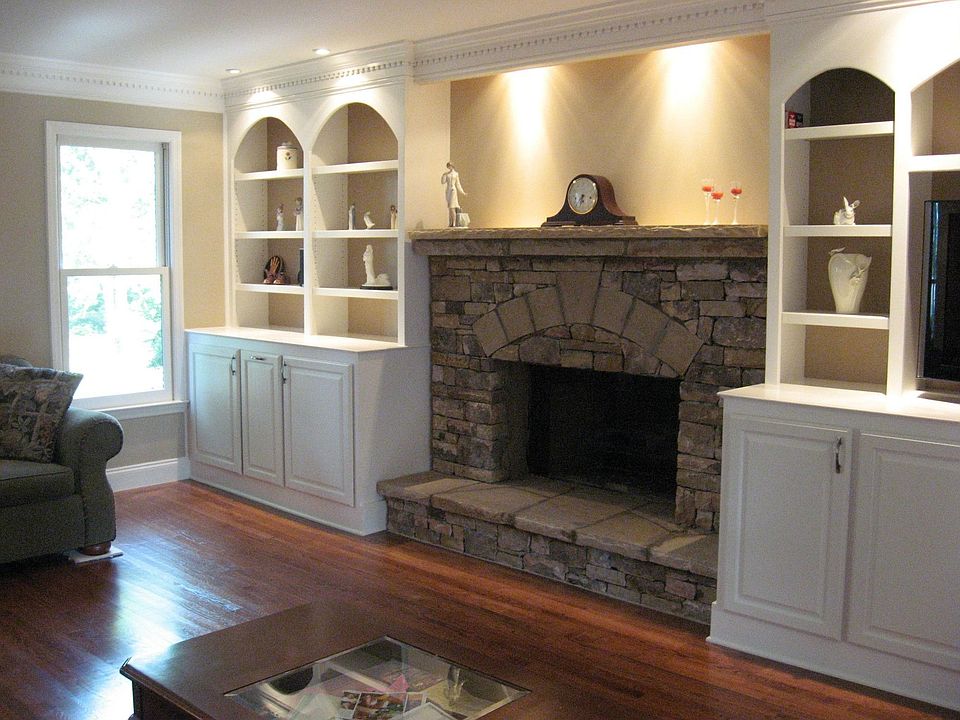 Newly renovated Great Room with built-ins, Surround Sound, & Stone Fireplace.