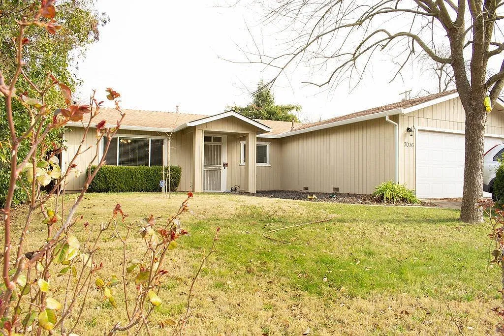 7036 Van Maren Ln photo 1