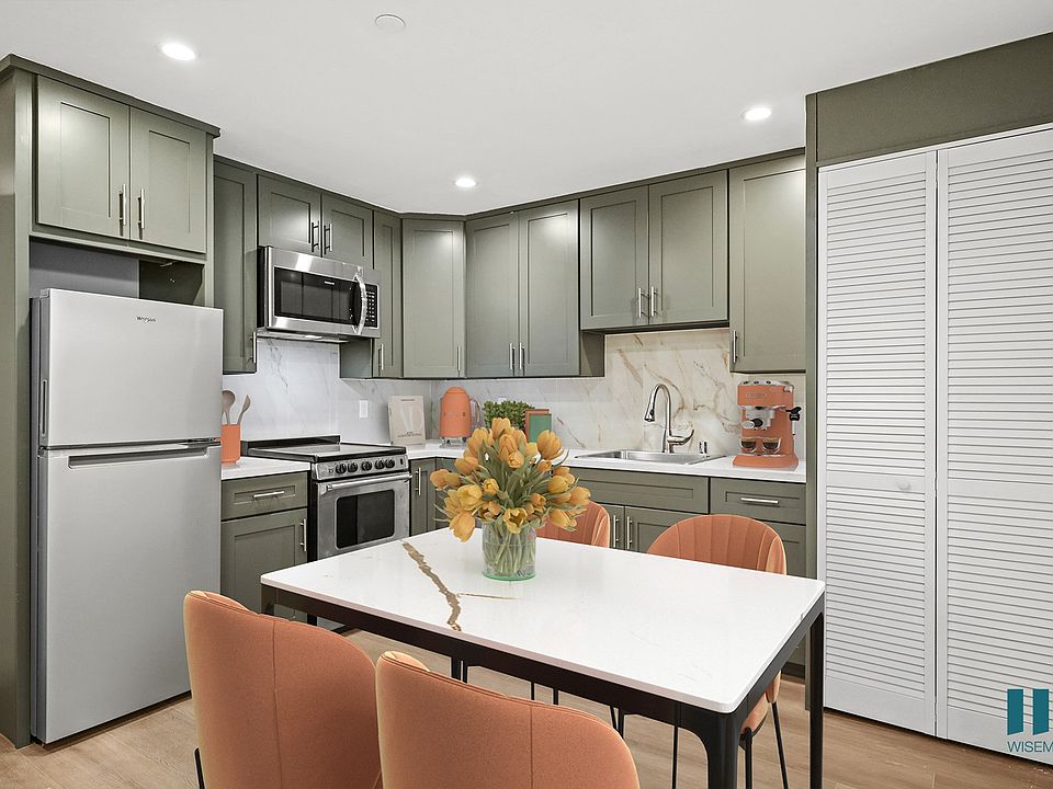 Studio with Full-Size Kitchen with Refrigerator, Stove, and Microwave Oven