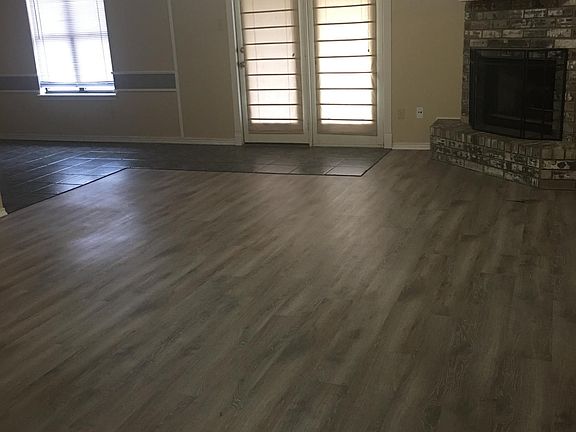 Living room with corner fireplace