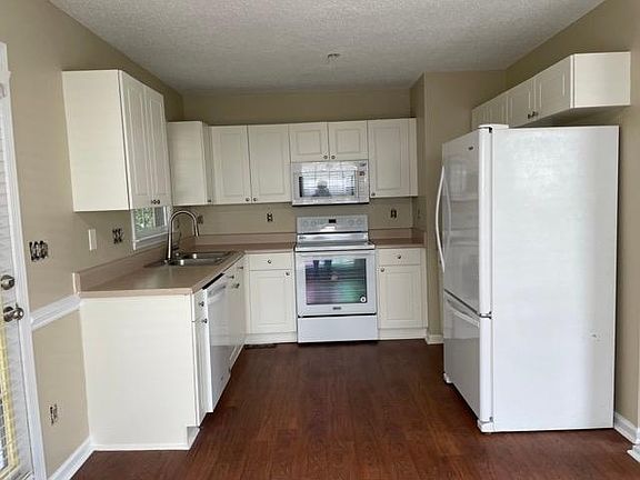 Kitchen with all White appliances