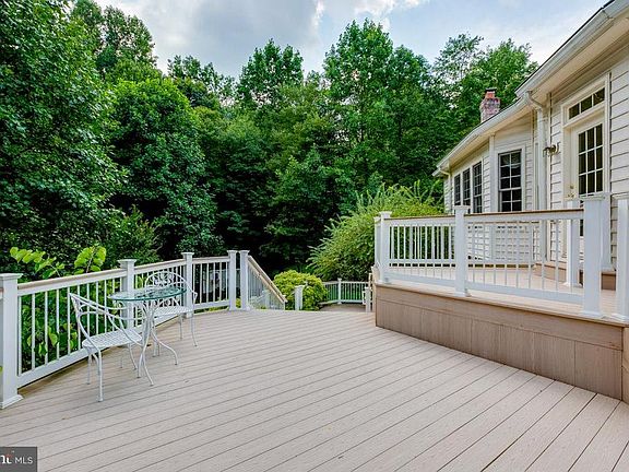Dine al fresco with views of wooded preserve