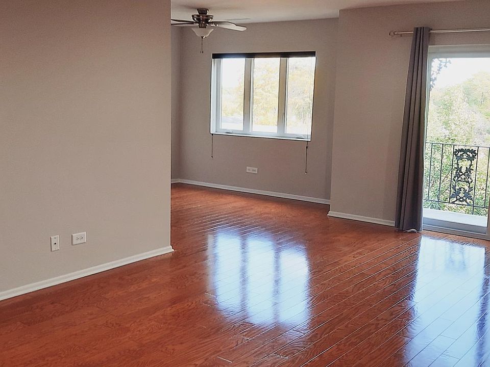Living and dining room space, looking east.