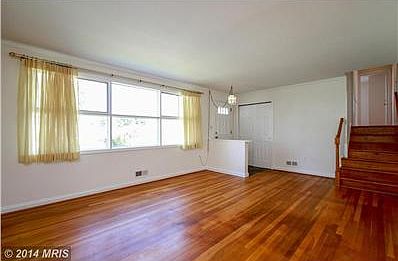 Slate tile and large coat closet at front entry