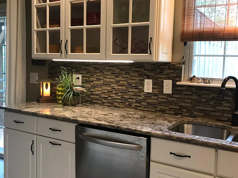 Granite countertops with stainless steel appliances