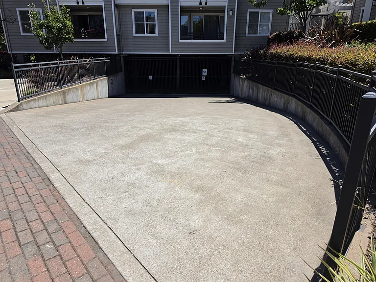 Gated garage to building