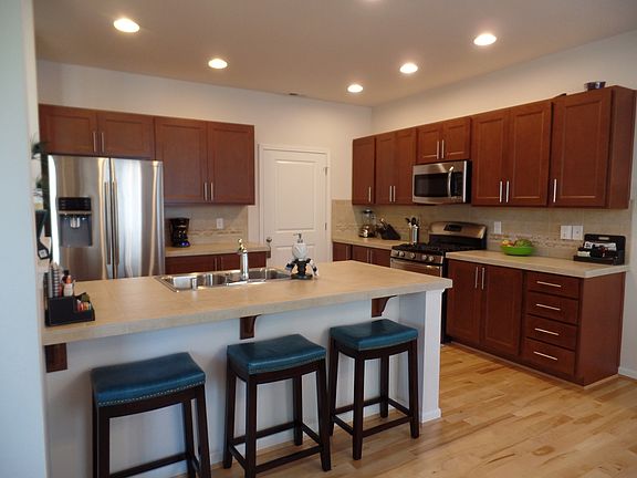 Spacious kitchen with pantry & plenty of cabinet & counter s