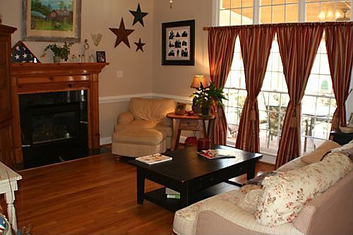 Great Room w/ vaulted ceilings & Hardwood floors