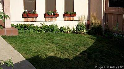 View from the gate towards the home of the front yard.