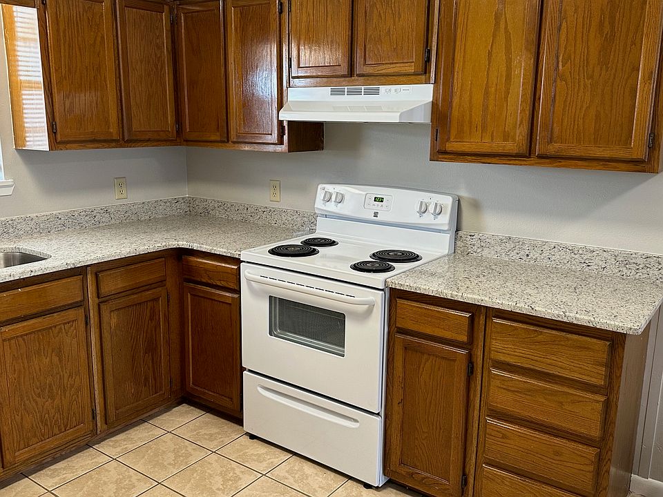 Kitchen with new granite countertops.