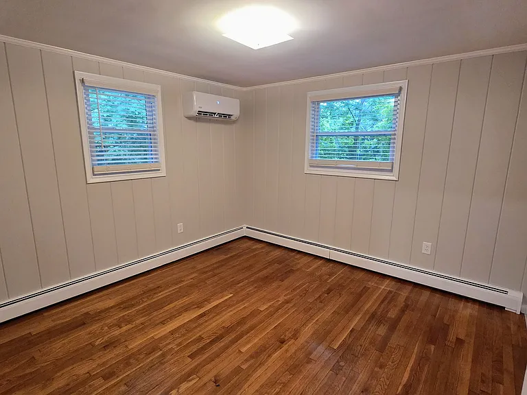 a bedroom; a mini split for heating and cooling