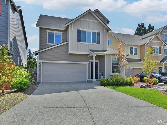 Drive way fits 4 cars and 2 car garage.