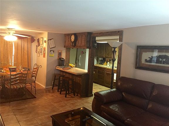 Adorable living, dining, and kitchen area.