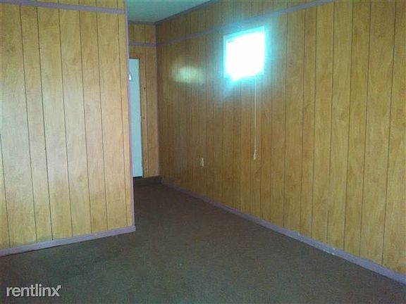 Den which leads to laundry room