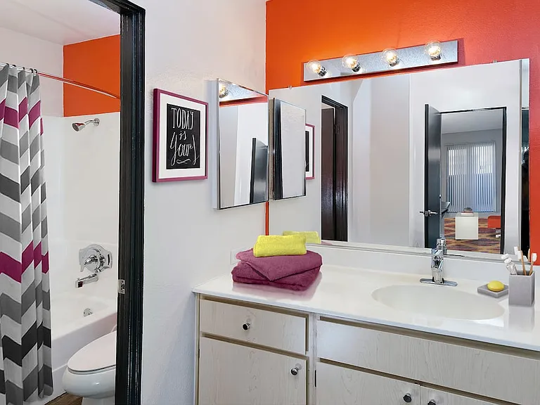 Classic Package III bath with white laminate countertop and oak cabinetry