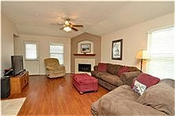 DEN WITH LAMINATE FLOORS