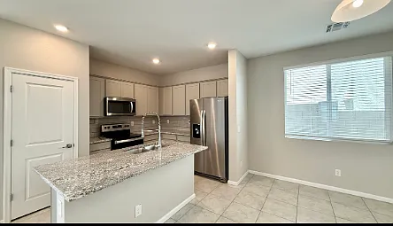 17381 W Daley Ln — Photo 2
