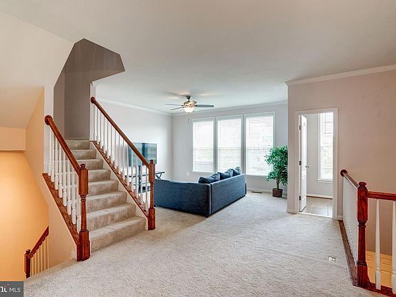 VIEW OF LIVING ROOM FROM DINING ROOM AREA
