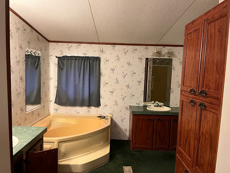 Entry into the master bathroom! Giant soaker Tub and his and her sinks!