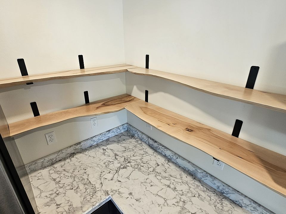 Raw Maple shelves repurposed from the Maple trees that stood on the property