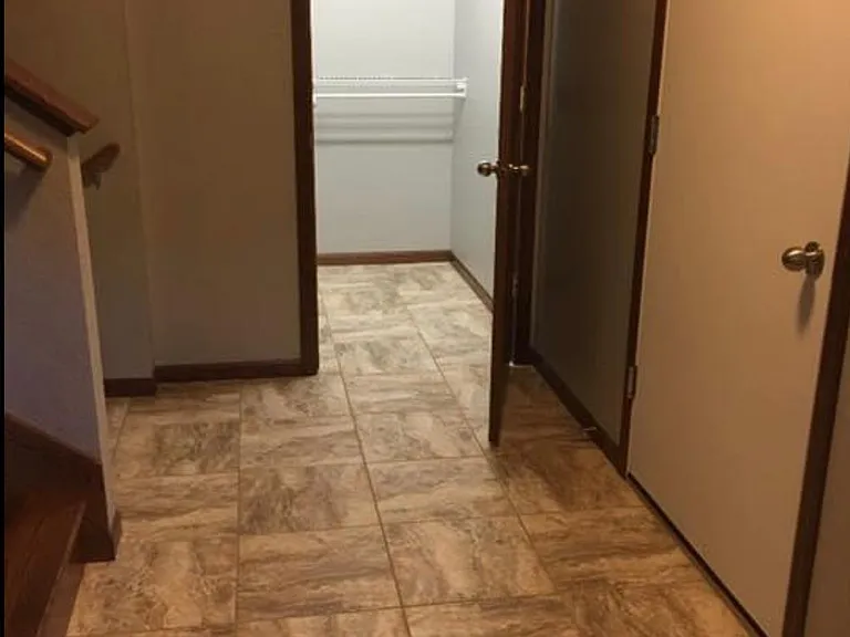 Entryway with large walk-in closet
