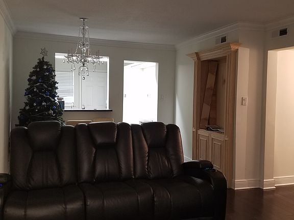 Livingroom with kitchen in back