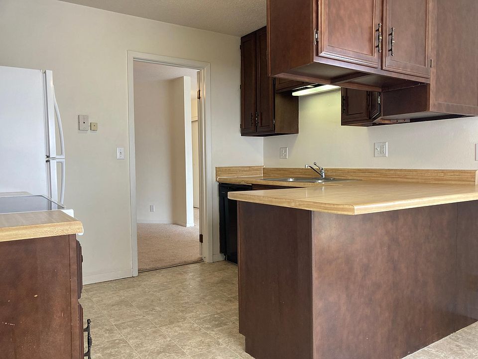 Kitchen cabinets view from kitchen dining area.