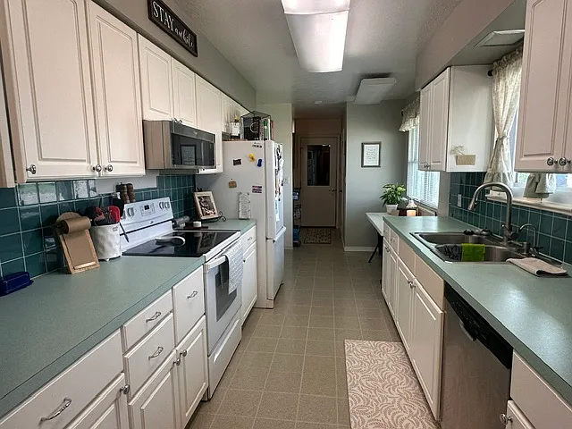 7100 Whitley Dr — Photo 7