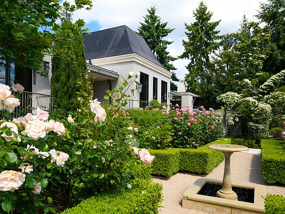 Magnificent rose garden and bubbling bird bath.