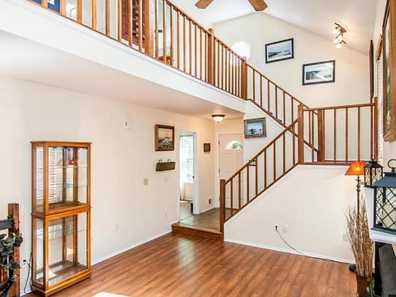 Stairs, front entry, and hallway