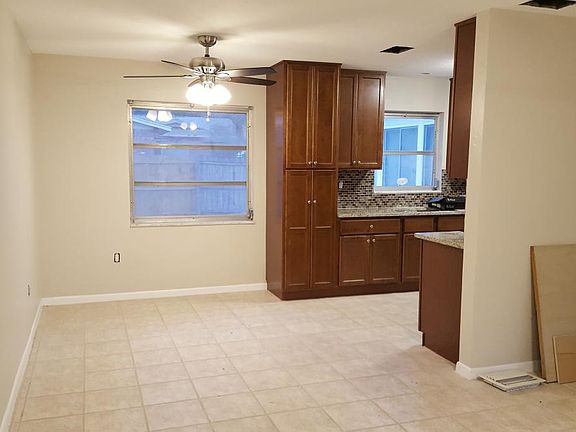 Living room opens to dining/kitchen