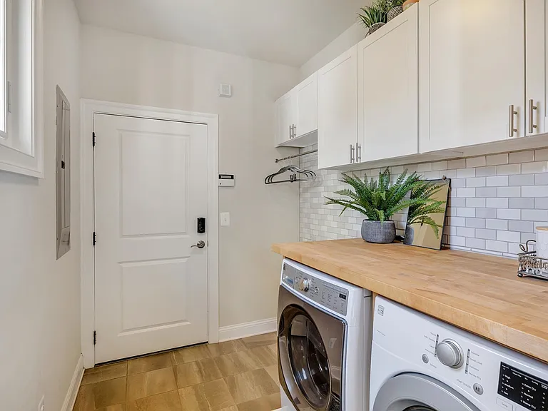Laundry room, connecting to the garage.