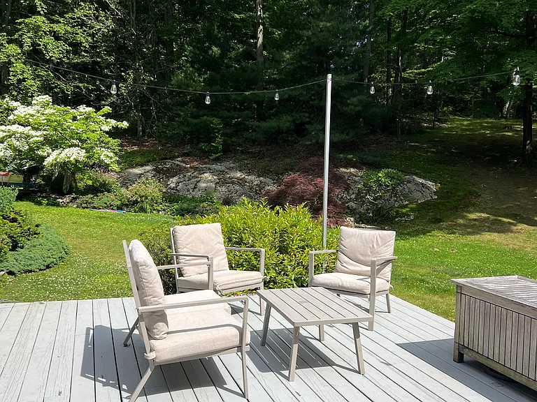 large deck with two sitting areas