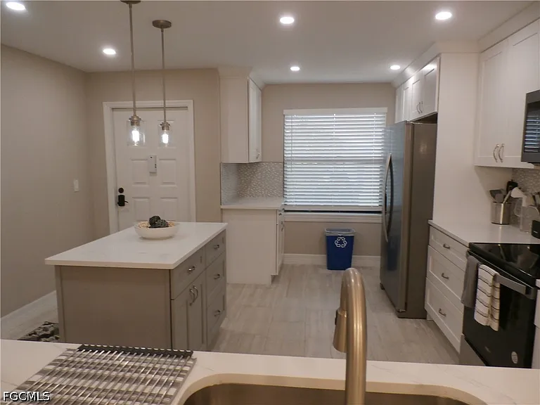 12621 Kelly Sands Way #305 — Photo 9
